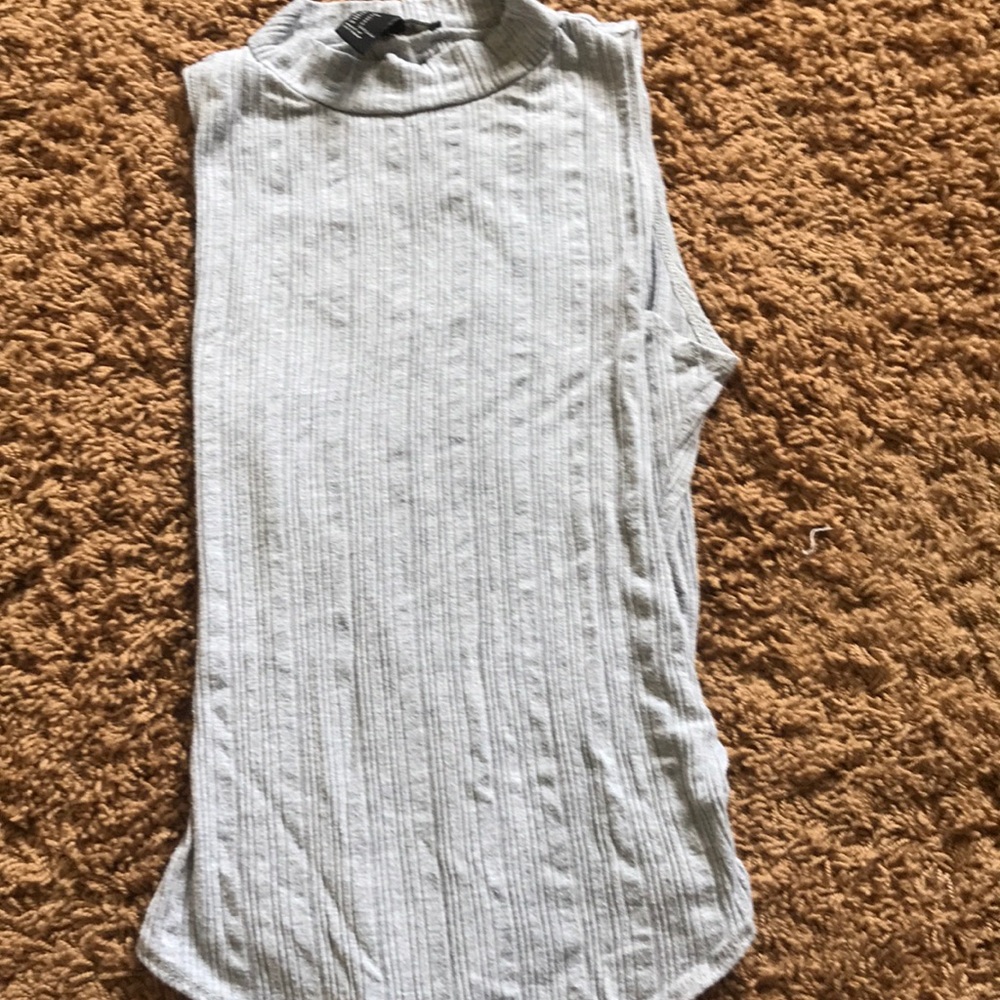 this is a forever 21,grey bodysuit,has no sleeves